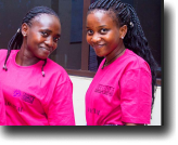 Young Lira residents developing the AGIC-BIZZ mobile applications that will link rural girls to online markets to sell products they produce locally