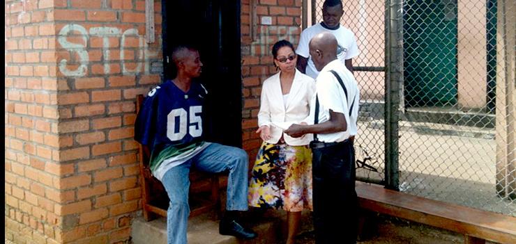 Mediation Specialist, Laurie Cooper, speaks with guards at the Firestone Prison Guardhouse